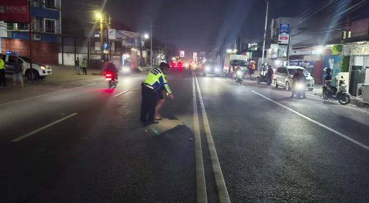 Petugas Unit Lakalantas Polresta Tangerang saat melakukan olah TKP. (Dok. Polresta Tangerang)