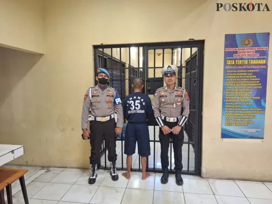 Tersangka OS saat berada di Rutan Polresta Tangerang. (Poskota/Veronica)