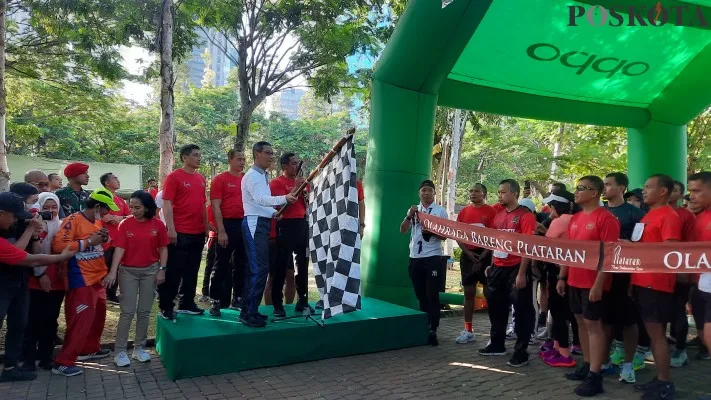 Pj Gubernur DKI melapas Olahraga Bareng yang digelar Plataran bersama Kopassus di Hutan Kota GBK. (foto: aldi)