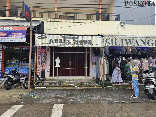 TKP penusukan pedagang baju di Kelapa Dua, Kabupaten Tangerang. (Poskota/Veronica)