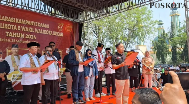 Sejumlah paslon peserta Pilkada Kota Bekasi saat melakukan deklarasi damai di Alun-alun Kota Bekasi, 25 September 2024. (Poskota/Ihsan)