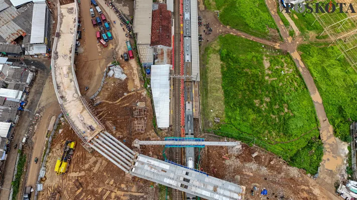 Foto Udara: Pembangunan jalan layang Tenjo penghubung Bogor-Tangerang di kawasan Tenjo, Kabupaten Bogor, Jawa Barat, Rabu, 25 Desember 2024. (Poskota/ Ahmad Tri Hawaari)