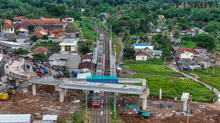 Foto Udara: Pembangunan jalan layang Tenjo penghubung Bogor-Tangerang di kawasan Tenjo, Kabupaten Bogor, Jawa Barat, Rabu, 25 Desember 2024. (Poskota/ Ahmad Tri Hawaari)