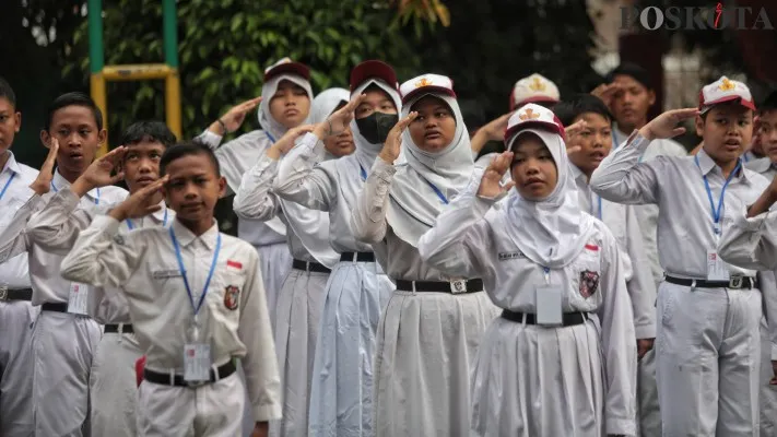 Pelaksanaan upacara Hari Guru Nasional 2025.(Sumber: Poskota/Ahmad Tri Hawaari)