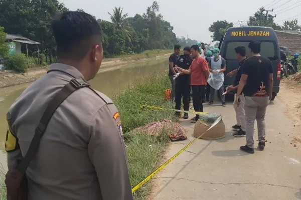 Pasutri ditemukan tewas tenggelam di Sungai Petung. Foto: Ist.