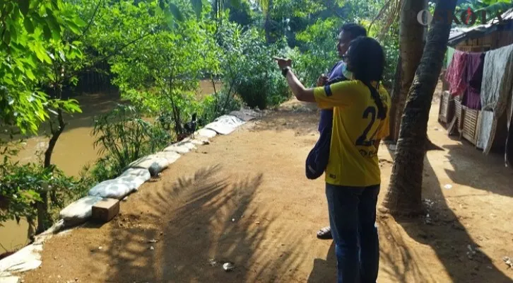 Wilayah RT 15/03 Kelurahan Cawang, Jakarta Timur yang berada di tepi Sungai Ciliwung menjadi salah satu lokasi yang bakal dinormalisasi dalam rangka untuk mencegah banjir, Jumat (17/9/2021). (Foto/cr02)