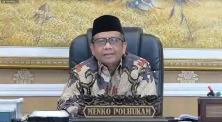 Menko Polhukam Mahfud MD saat hadir secara virtual di Muktamar IV Wahdah Islamiyah. (foto: dok MUI)