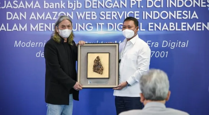 bank bjb atau bank dengan kode emiten BJBR melakukan aksi korporasi besar dengan menggandeng raksasa data center terbesar di Asia Tenggara, PT DCI Indonesia, Tbk (DCI). (ist)