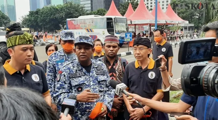 Dharmapala Nusantara melaporkan eks Menpora, Roy Suryo ke Polda Metro Jaya buntut unggahan meme stupa mirip Presiden Jokowi. (foto: poskota/andi adam faturahman)