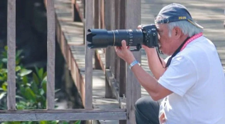 Momen Basuki Hadimuljono jadi fotografer di KTT G20. (Instagram/@kemenpupr)