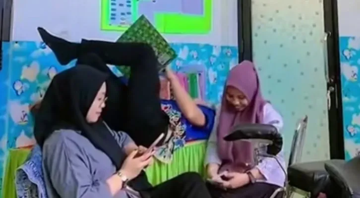 Tangkapan Layar tiga oknum Tenaga kesehatan membuat konten video reaksi pasien umum dan pasien BPJS. (Ist.)