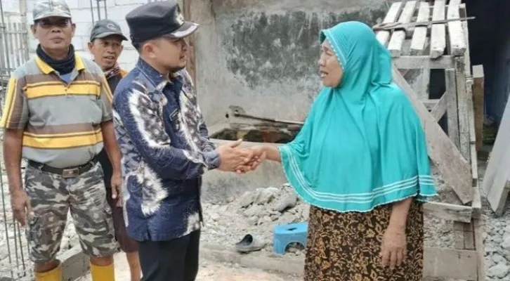 Warga penerima rutilahu di Kabupaten Bekasi. (Ist).