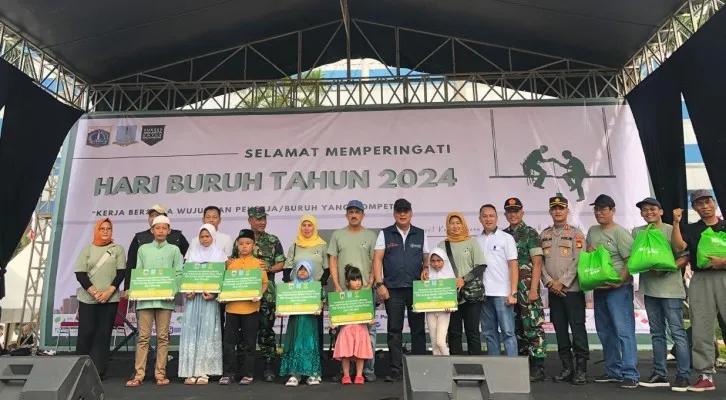 Foto: BPJS Ketenagakerjaan Jakarta Ceger Salurkan 129 paket Sembako di Acara May Day Jakarta Timur. (Dok. BPJS Ketenagakerjaan Jakarta Ceger)