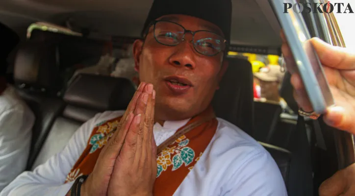 Bakal calon pasangan Calon Gubernur dan Wakil Gubernur DKI Jakarta Ridwan Kamil dan Suswono saat mendatangi bersama pendukung menuju Kantor KPU DKI Jakarta, Salemba, Jakarta Pusat, Rabu (28/8/2024). Pasangan Ridwan Kamil dan Suswono resmi mendaftarkan diri sebagai peserta Pemilihan Gubernur DKI Jakarta 2024 dengan dukungan Partai Golkar, Gerindra, PAN, PKS, Demokrat, PSI dan PKB Poskota/Ahmad Tri Hawaari