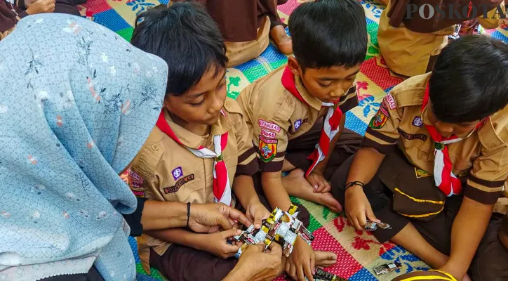 Kartu Indonesia Pintar: Syarat, Dokumen, dan Cara Daftarnya/Ilustrasi (Poskota/Ahmad Tri Hawaari)