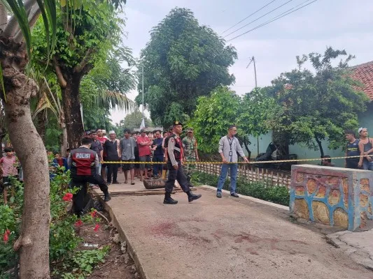 Garis kepolisian terpasang dekat kediaman korban di Babelan Bekasi. (Ist)