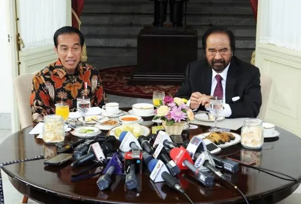 Presiden Jokowi dan Ketua Umum Partai NasDem, Surya Paloh. (Foto: Setkab.go.id).