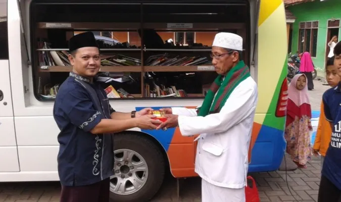 Kegiatan perpustakaan keliling Dinas Perpusip di Kabupaten Tangerang. (Ist)