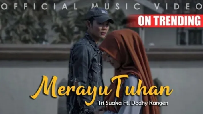 Lirik lagu Merayu Tuhan Tri Suaka ft Dodhy Kangen Band yang Trending YouTube. (YouTube)