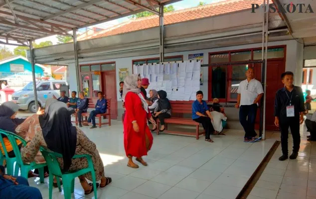 Suasana PSU Pemilu 2024 di TPS 13 Kebon Cau, Pandeglang. (Foto: Poskota/Samsul Fatoni)