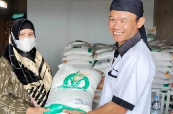 Pencairan bantuan beras 10 kg dan cara cek status penerimanya. (Website resmi Pemerintah Kabupaten Sumedang)