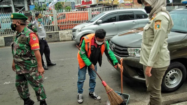 Operasi Yustisi Pencegahan Covid-19. (foto: poskota/ahmad tri hawaari)