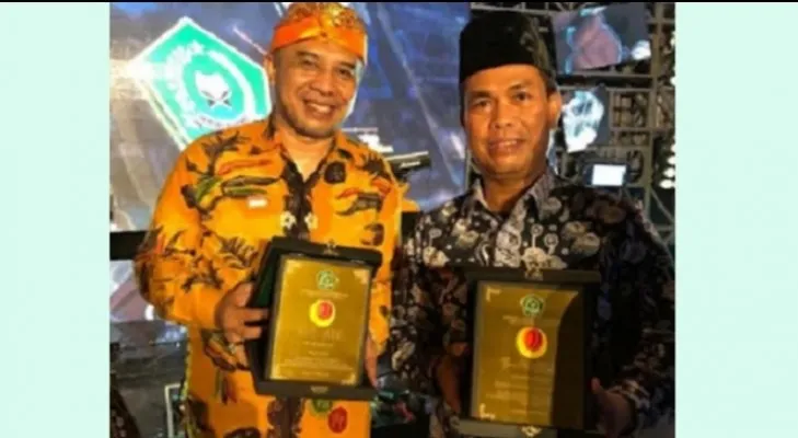 Penghargaan dari Kemenag  kepada Bupati Bogor Ade Yasin diterima Asisten Pemerintahan dan Kesejahteraan Rakyat Hadijana di Denpasar Bali pada Jumat (20/5/2022).