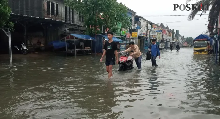 Banjir di Pondok Ungu Permai, Jumat pagi, 24 Februari 2024. (Poskota/Ihsan Fahmi