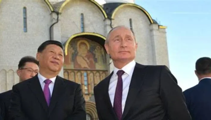 Pemimpin Tiongkok Xi Jinping dan Pemimpin Rusia Vladimir Putin.