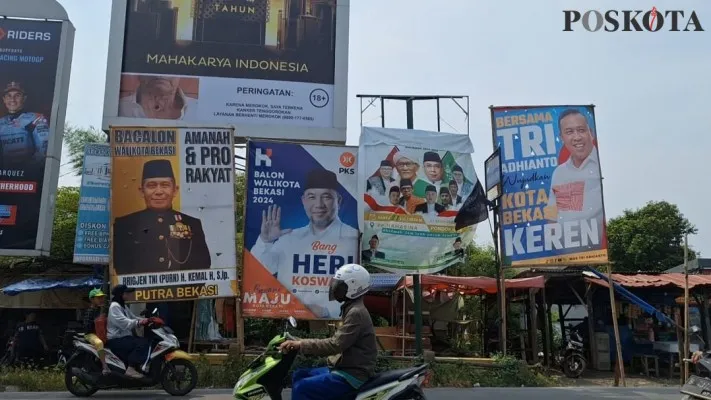 Sejumlah APK Bakal Calon Wali Kota Bekasi tersebar di pertigaan Jalan Lingkar Utara, Kaliabang, Bekasi Utara, Kota Bekasi. (Poskota.co.id/Ihsan Fahmi)