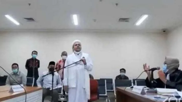 Habib Rizieq Shihab saat jalani sidang perdana secara virtual. (dok)