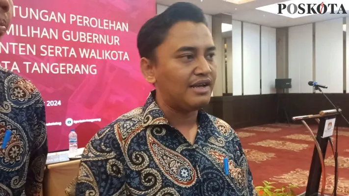 Komisioner KPU Kota Tangerang, Yudhistira Prasastra seusai melakukan rapat leno penghitungan suara Pilkada 2024. (Poskota/Veronica Prasetio)