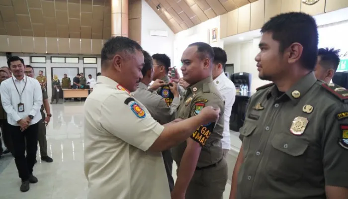 Pengukuhan anggota ketertiban satlinmas Kabupaten Tangerang. (Foto/ist)