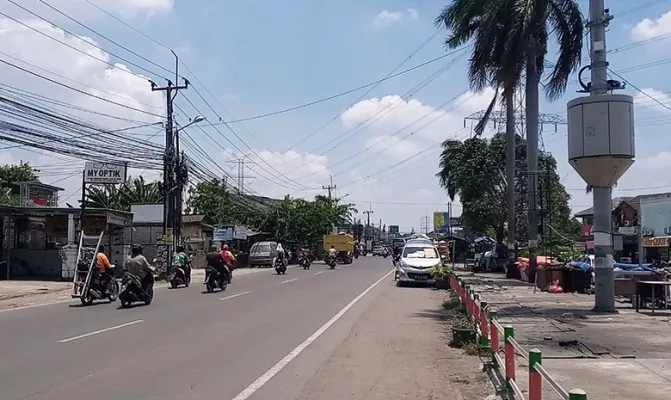 Akses jalan menuju perumahan Alinda, yang berada di jalan lingkar Utara, Kelurahan Kaliabang Tengah, Kecamatan Bekasi Utara. (Foto/if)