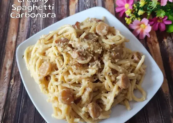 Coba praktekkan resep creamy spaghetti carbonara yang padukan rasa gurih dan creamy dalam sekali suapan. (Cookpad/@farah_annisa)