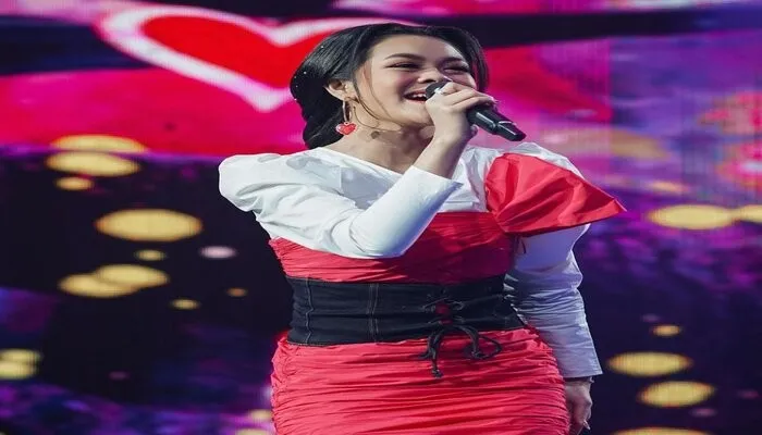 Potret Melly Lee peraih juara pertama di puncak Grand Final D'Academy Asia. Foto: Instagram.