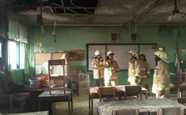 Ruang kelas di SMAN 34 Jakarta terbakar, diduga karena korsleting arus listrik.(Ist)